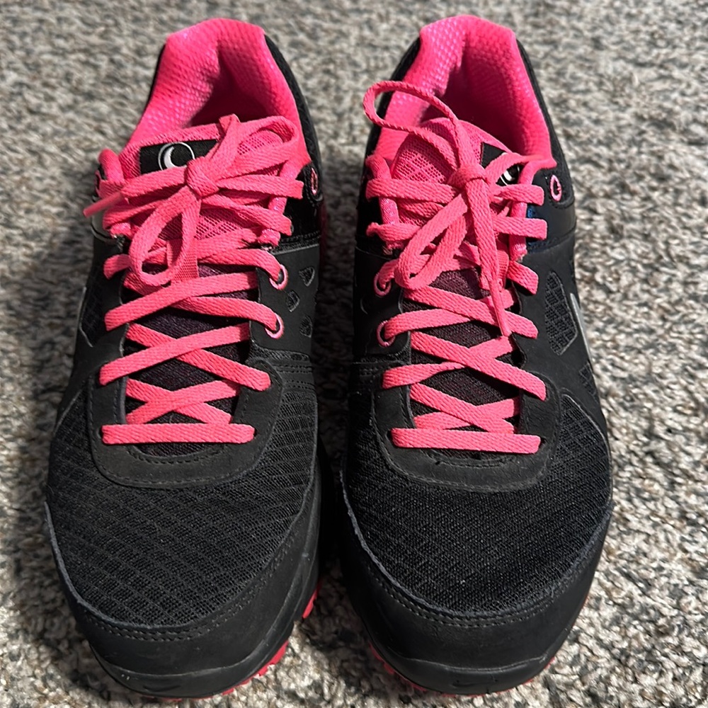 Pink and Black Nike shoes